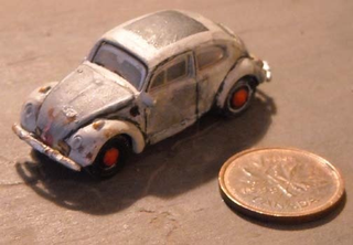 Illustration for article titled Crazed Modelmaker Makes Tiny-Scale Model Of Murilee's First-Ever Hell Project